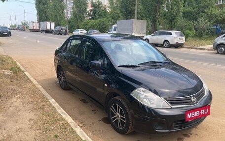 Nissan Tiida, 2010 год, 650 000 рублей, 5 фотография