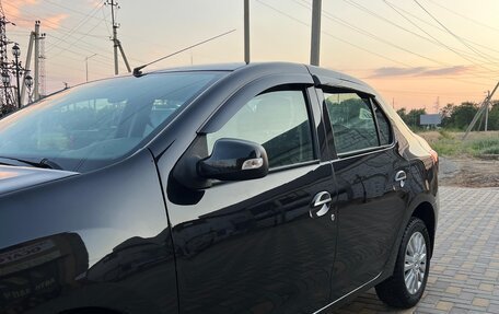 Renault Logan II, 2014 год, 750 000 рублей, 10 фотография