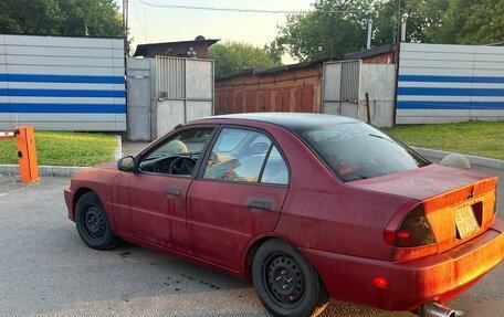 Mitsubishi Mirage VI рестайлинг, 2001 год, 295 000 рублей, 6 фотография
