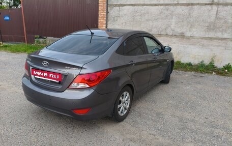Hyundai Solaris II рестайлинг, 2011 год, 1 000 050 рублей, 13 фотография