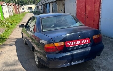 Mitsubishi Carisma I, 1997 год, 250 000 рублей, 4 фотография