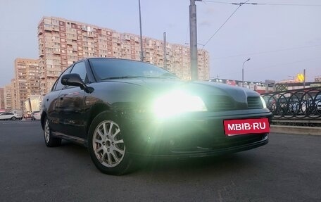 Mitsubishi Carisma I, 2002 год, 250 000 рублей, 19 фотография