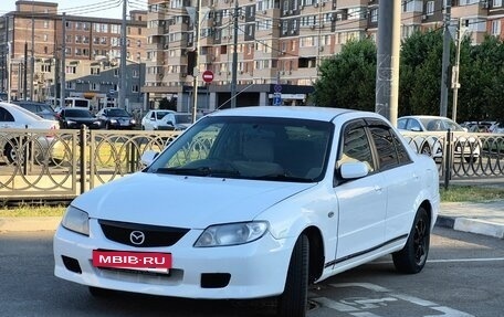 Mazda Familia, 2001 год, 210 000 рублей, 3 фотография