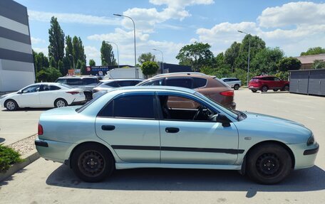 Mitsubishi Carisma I, 2002 год, 250 000 рублей, 18 фотография