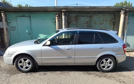 Mazda Familia, 1998 год, 335 000 рублей, 8 фотография