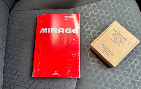 Mitsubishi Mirage VI рестайлинг, 2012 год, 750 000 рублей, 22 фотография