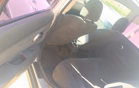 Nissan Tiida, 2010 год, 795 000 рублей, 13 фотография