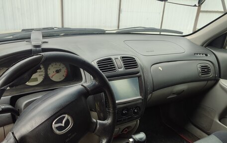 Mazda 323, 2003 год, 150 000 рублей, 3 фотография
