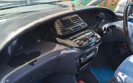 Toyota Estima III рестайлинг -2, 1995 год, 400 000 рублей, 13 фотография