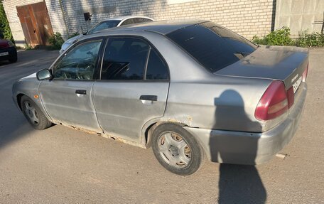 Mitsubishi Lancer VII, 1997 год, 155 000 рублей, 9 фотография