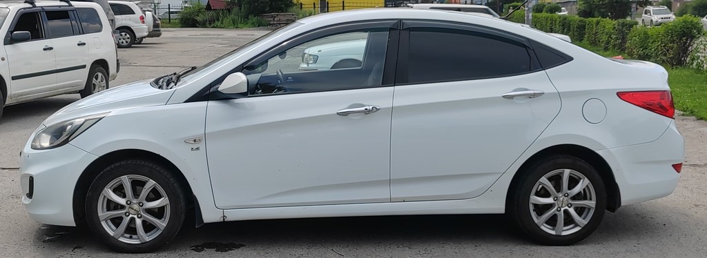 Hyundai Solaris I, 2012 год, 650 000 рублей, 2 фотография