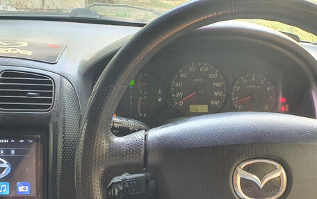 Mazda Familia, 1999 год, 285 000 рублей, 13 фотография