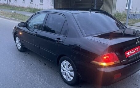 Mitsubishi Lancer IX, 2006 год, 299 999 рублей, 5 фотография