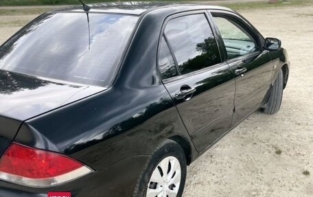 Mitsubishi Lancer IX, 2006 год, 299 999 рублей, 19 фотография