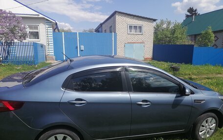 KIA Rio III рестайлинг, 2013 год, 650 000 рублей, 11 фотография