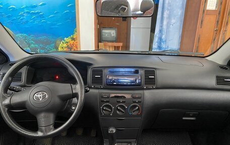 Toyota Corolla, 2004 год, 650 000 рублей, 16 фотография
