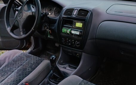 Mazda 323, 1999 год, 95 000 рублей, 3 фотография