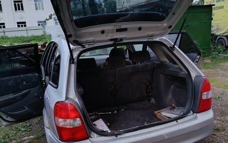 Mazda 323, 1999 год, 95 000 рублей, 7 фотография