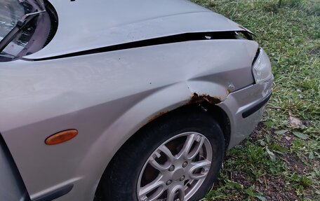 Mazda 323, 1999 год, 95 000 рублей, 6 фотография