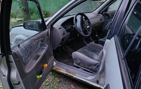 Mazda 323, 1999 год, 95 000 рублей, 9 фотография