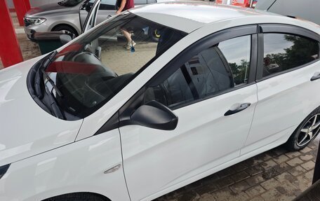 Hyundai Solaris II рестайлинг, 2011 год, 700 000 рублей, 5 фотография