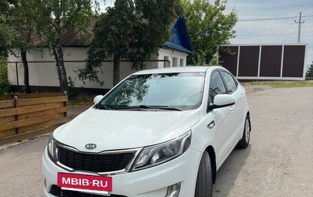 KIA Rio III рестайлинг, 2012 год, 550 000 рублей, 10 фотография