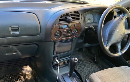 Mitsubishi Mirage VI рестайлинг, 1997 год, 90 000 рублей, 8 фотография