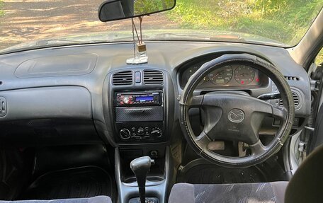 Mazda Familia, 1998 год, 269 000 рублей, 24 фотография