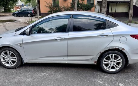 Hyundai Solaris II рестайлинг, 2011 год, 700 000 рублей, 4 фотография