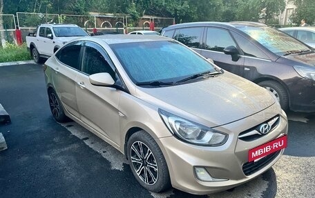 Hyundai Solaris II рестайлинг, 2011 год, 667 000 рублей, 3 фотография