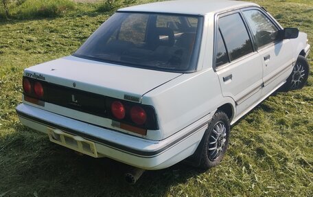 Nissan Langley III, 1989 год, 144 000 рублей, 2 фотография