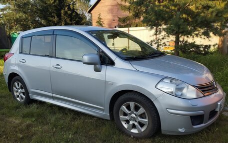 Nissan Tiida, 2010 год, 560 000 рублей, 4 фотография