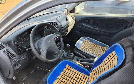 Mitsubishi Colt VI рестайлинг, 1998 год, 80 000 рублей, 11 фотография