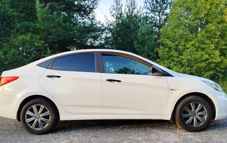 Hyundai Solaris II рестайлинг, 2011 год, 650 000 рублей, 5 фотография