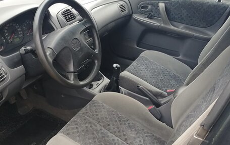 Mazda 323, 1998 год, 245 000 рублей, 3 фотография
