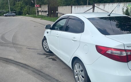 KIA Rio III рестайлинг, 2013 год, 785 000 рублей, 2 фотография
