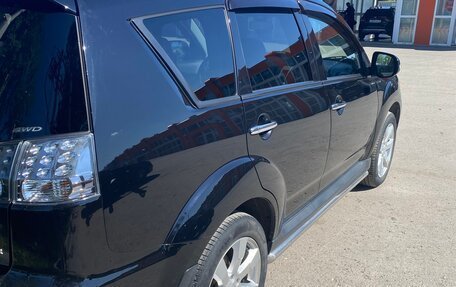 Mitsubishi Outlander III рестайлинг 3, 2011 год, 1 130 000 рублей, 11 фотография
