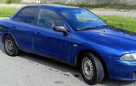 Mitsubishi Carisma I, 2002 год, 220 000 рублей, 3 фотография