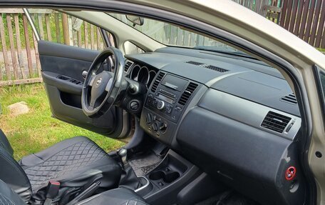 Nissan Tiida, 2010 год, 590 000 рублей, 9 фотография