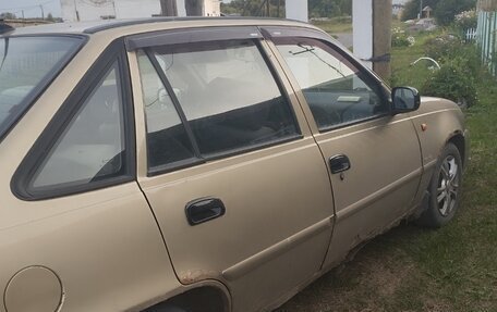 Daewoo Nexia I рестайлинг, 2010 год, 100 000 рублей, 3 фотография