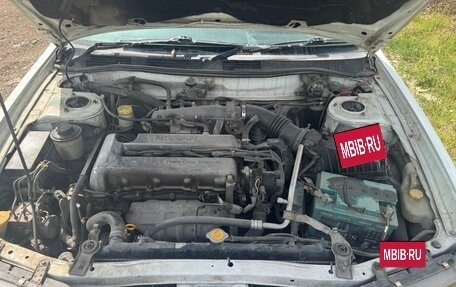 Nissan Bluebird XI, 1997 год, 210 000 рублей, 11 фотография