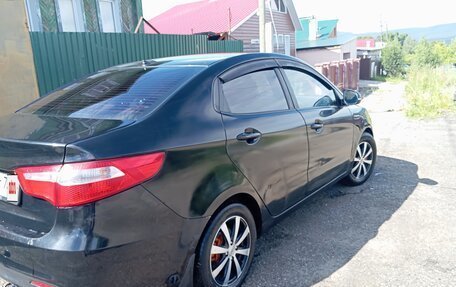KIA Rio III рестайлинг, 2012 год, 660 000 рублей, 2 фотография
