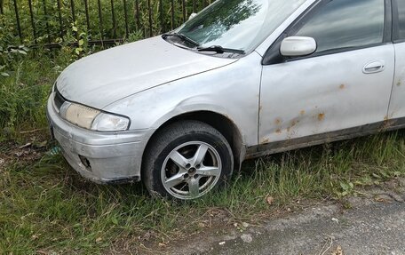 Mazda Familia, 1997 год, 165 000 рублей, 6 фотография
