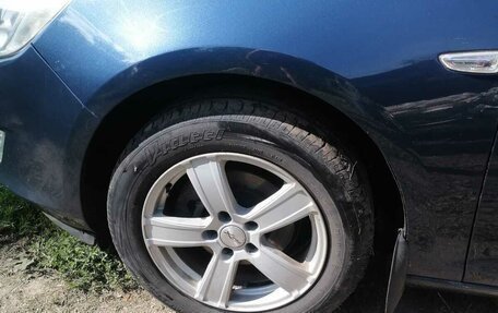 Opel Astra J, 2011 год, 750 000 рублей, 17 фотография