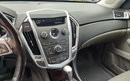 Cadillac SRX II рестайлинг, 2010 год, 950 000 рублей, 11 фотография