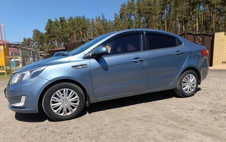 KIA Rio III рестайлинг, 2012 год, 610 000 рублей, 21 фотография