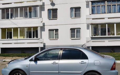 Toyota Corolla, 2004 год, 700 000 рублей, 3 фотография