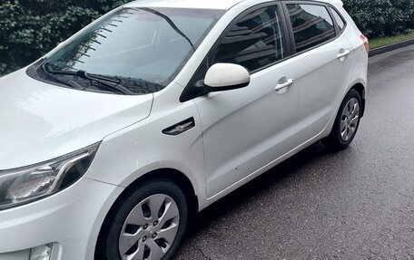 KIA Rio III рестайлинг, 2012 год, 750 000 рублей, 2 фотография