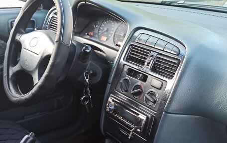 Toyota Avensis III рестайлинг, 1998 год, 290 000 рублей, 11 фотография