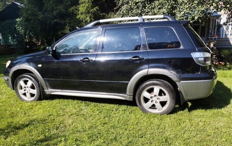 Mitsubishi Outlander III рестайлинг 3, 2004 год, 649 000 рублей, 4 фотография